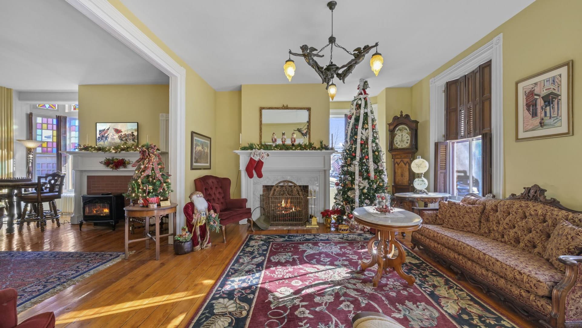 The main parlor at the Swope Manor with fireplace in the background