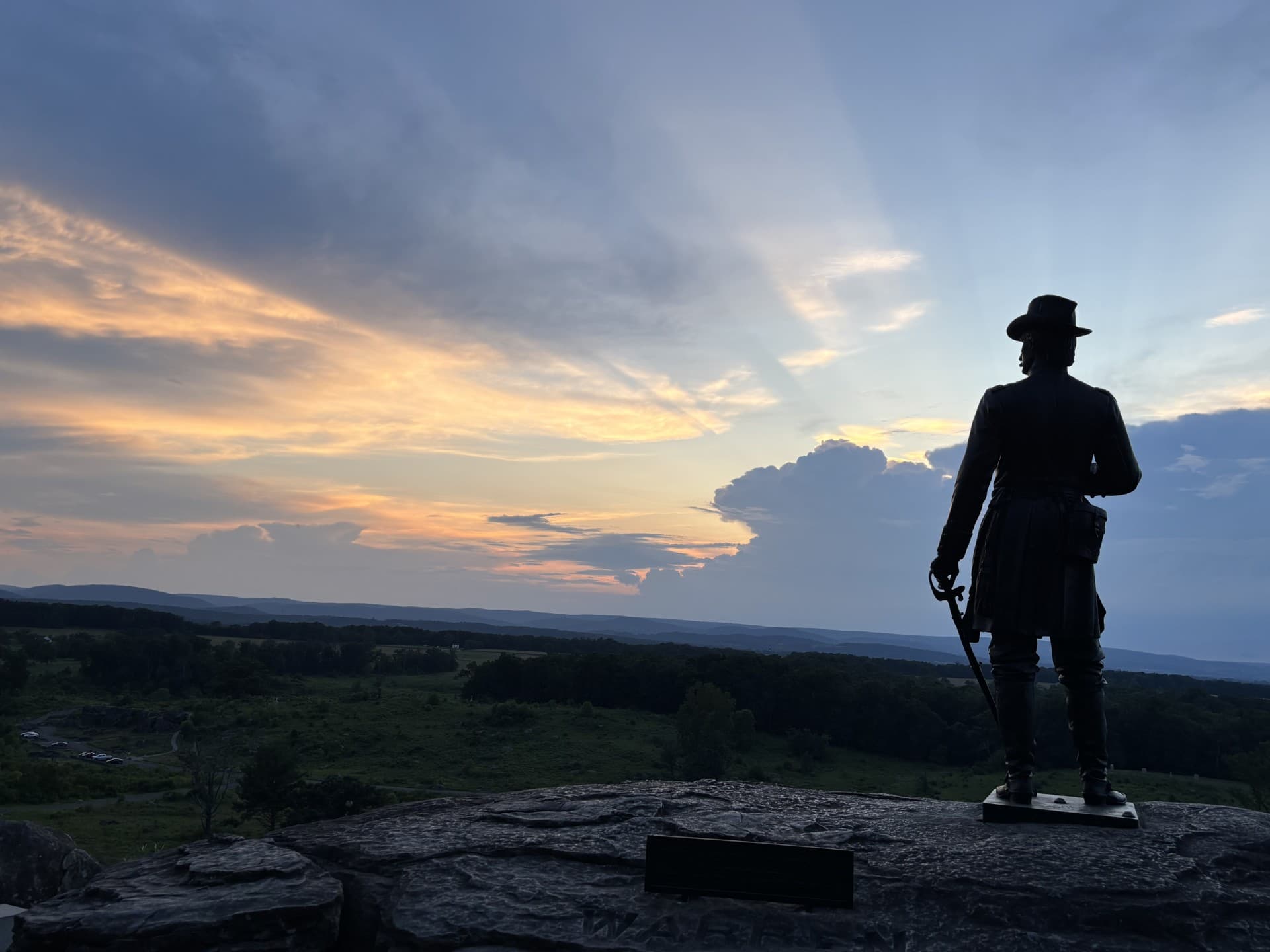 photo of the sunset and warren statue from the crest of little round top photo of the sunset and warren statue from the crest of little round top